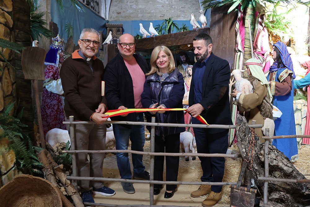 Inauguración del Belén de la Cofradía de la Soledad en la Iglesia de San Millán.