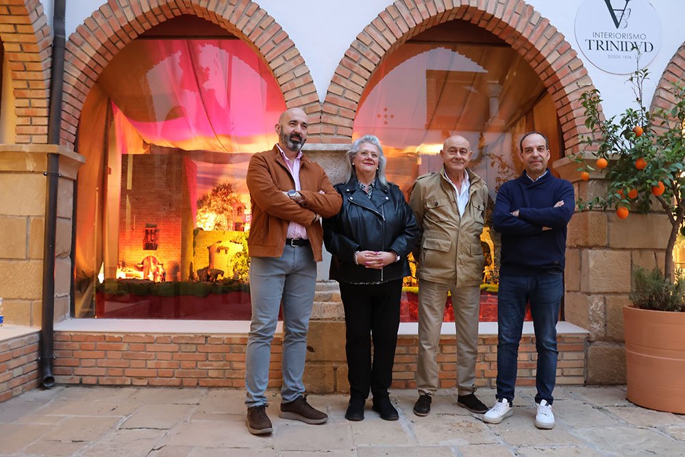 Inauguración del belén navideño de la empresa 'Interiorismo Trinidad' en Úbeda.